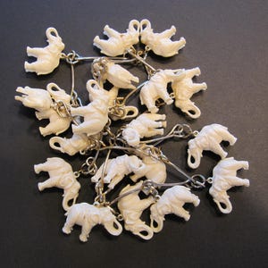 Necklace of Early celluloid or plastic elephants
