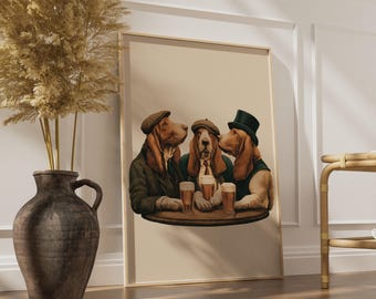 May include: A framed wall art print featuring three Basset Hound dogs sitting at a round table, each holding a glass of beer. The dogs are wearing hats, including a flat cap and a top hat, and are dressed in jackets and vests against a beige background.