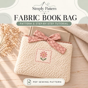 May include: A cream-colored textured fabric book bag featuring a pink floral bow and a square patch with a pink flower graphic. The text reads Simply Pattern Studio, FABRIC BOOK BAG, PATTERN & STEP-BY-STEP TUTORIAL, PDF SEWING PATTERN.