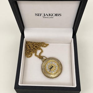 Salvest 9 karat guldpläterad mekanisk hängeklocka med romerska siffror och graverad kedja