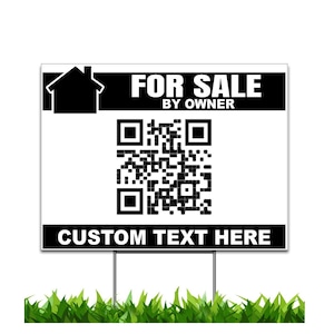 May include: A white real estate sign with black text that reads "FOR SALE BY OWNER" and "CUSTOM TEXT HERE". A QR code is in the center. The sign is on metal stakes, with green grass at the bottom.
