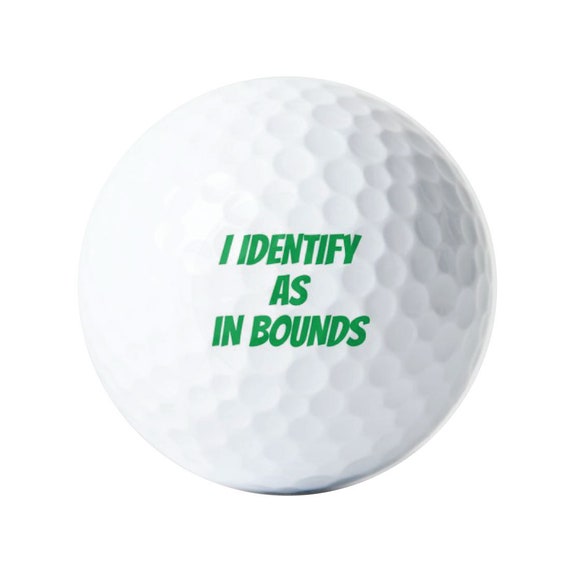 White Golf Balls With Funny Cap Stock Photo - Download Image Now