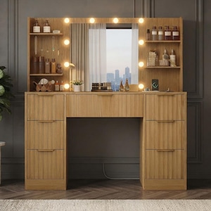 May include: A light wood vanity table featuring a central rectangular mirror surrounded by integrated LED lights. The unit includes six drawers with horizontal handles, open shelving on both sides for storage, and a flat tabletop surface.