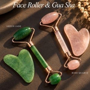 May include: A green jade face roller and gua sha set alongside a rose quartz face roller and gua sha set. The tools feature rose gold metal hardware. Text on the image reads: Face Roller & Gua Sha, GREEN JADE, ROSE QUARTZ, CHOOSE YOUR TOOL EACH SOLD SEPARATELY.
