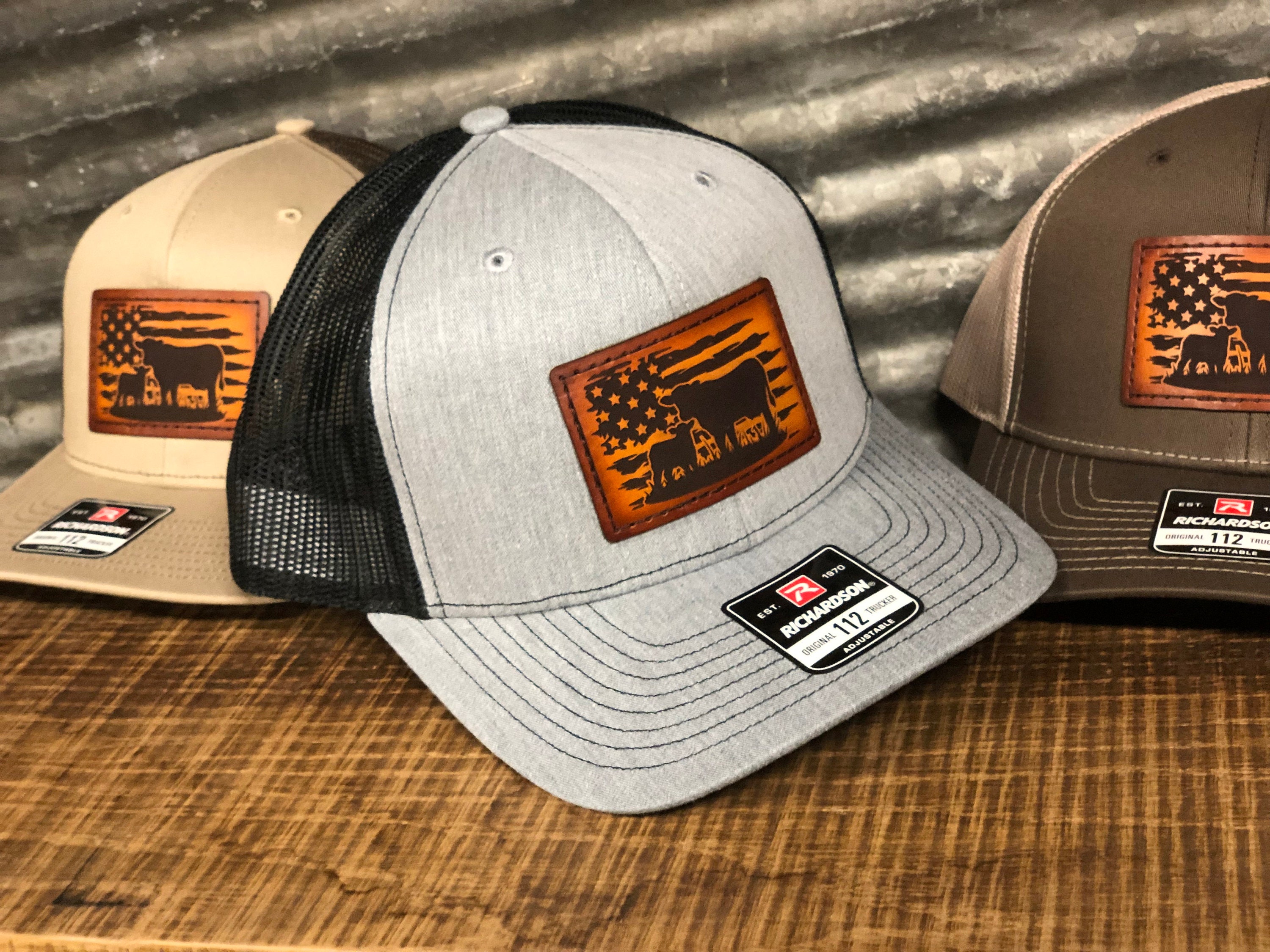 designer patched trucker hat — reworked vintage clothing and much