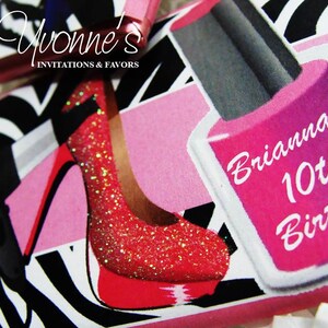 May include: A pink and white zebra print background with a pink nail polish bottle that says "Brianna's 10th Birthday". There is a red sparkly high heel shoe and a black hair dryer on the background.