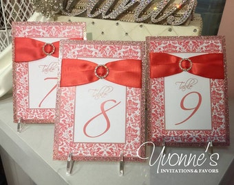Table Numbers in Coral-Salmon with Ribbon, Bling, Glitter - for Wedding Reception Tables, Party Decorations, Party Signs