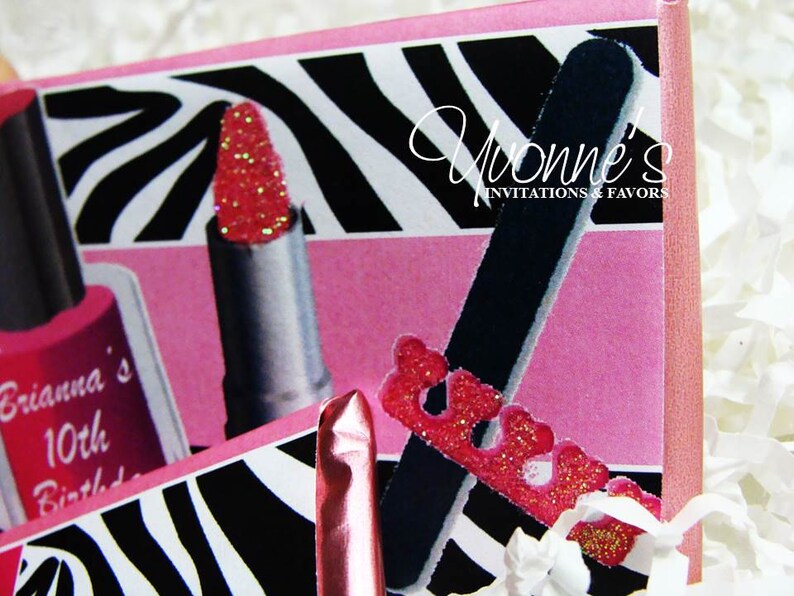 May include: Pink and black zebra print party favor boxes with a pink nail file and a pink lipstick with glitter. The boxes have the text "Briana's 10th Birthday" and "Yvonne's Invitations & Favors".