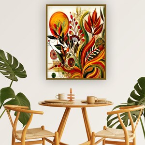 May include: Abstract botanical art print featuring a vibrant array of colors. The artwork showcases stylized flowers, leaves, and a sun-like shape, with a palette of red, yellow, and green. The print is framed in a gold-colored frame.