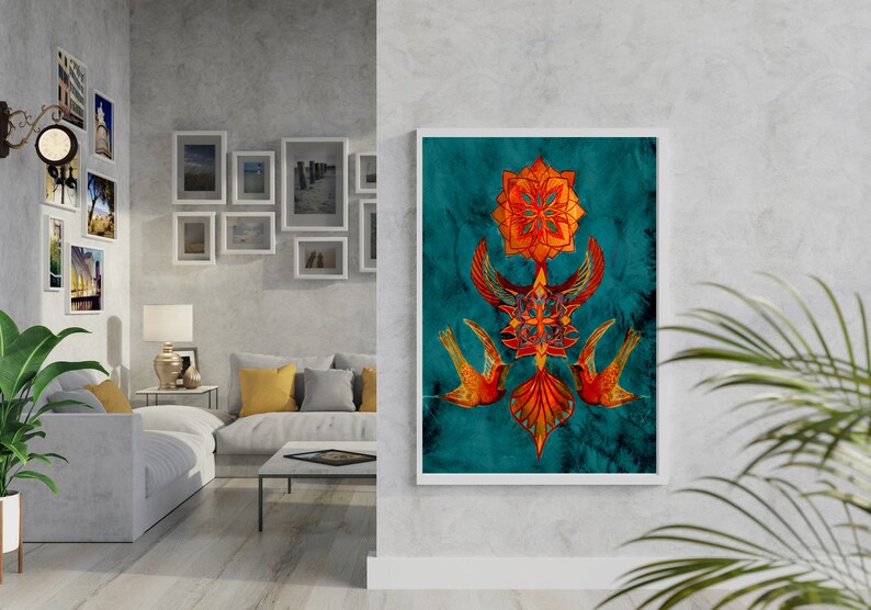 May include: A teal blue framed print with a geometric design in orange and gold. The design features a stylised flower with birds on either side.