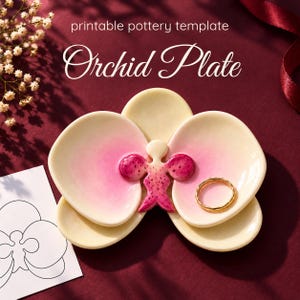 May include: A ceramic orchid-shaped dish with cream-colored petals and a vibrant pink center. The text reads printable pottery template Orchid Plate. A gold ring rests on the dish, which is accompanied by a paper template outline.