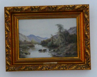 Tableau ancien des Highlands écossaises encadré « Dans un vallon des Highlands » par A. de Bréanski, grand cadre orné doré, estampe traditionnelle représentant des bovins des Highlands