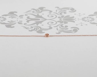 Pulsera con botones en oro rosa de 14 quilates