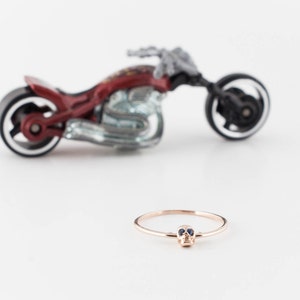 14K Rose Gold Moving Skull Ring with Sapphire Eyes image 4