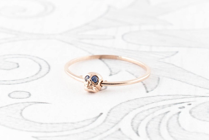 14K Rose Gold Moving Skull Ring with Sapphire Eyes image 2