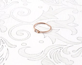 Anillo baguette de diamantes en oro rosa de 14 quilates