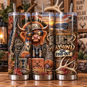 May include: A stainless steel tumbler featuring a Highland cow wearing sunglasses and a cap, surrounded by hunting gear, autumn leaves, and a sunset forest scene. The text reads BUCK AROUND AND FIND OUT, DEER SEASON, and PREMIUM DEER ATTRACTANT.