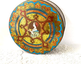 Vintage tin ornate gold blue design Victorian woman round storage container stash box Hostess Fruit Cake