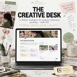 May include: A laptop displaying The Creative Desk Notion workspace template. The screen shows a digital dashboard with sections for projects, planning, and studio life. Surrounding the laptop are stationery, a mug, and printed text overlays.