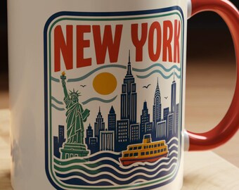 May include: A white ceramic mug with a red interior and handle, featuring a graphic illustration of the New York City skyline, the Statue of Liberty, and a ferry boat. The text NEW YORK is printed in red at the top of the rectangular design.