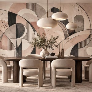 May include: A dining room featuring a large oval dark wood table surrounded by four cream-colored upholstered chairs. Above the table hang three pendant lights. The wall behind is covered in a mural with abstract shapes in black, pink, and beige.