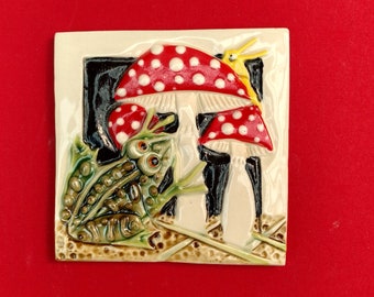 Azulejo de rana y setas