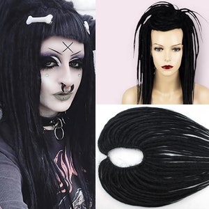 May include: Black synthetic dreadlock extensions. The dreadlocks are long and straight, and they are arranged in a fan shape. The dreadlocks are made of a soft, synthetic material that is easy to style and maintain.