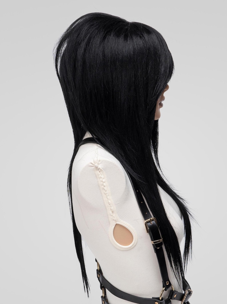 Emo wig in black with layered cut and long side fringe, styled professionally for alternative goth fashion, cosplay costumes, or 360 density synthetic hair needs.