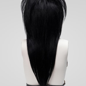 Back view of long black scene hair wig with layered synthetic strands and full 360 wig density, ideal for unisex cosplay, fashion styling, and hair loss solutions.