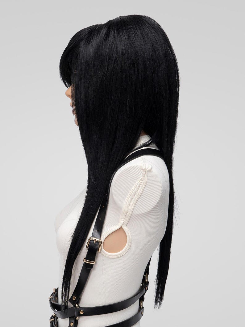 Side profile of long black alternative wig with side-swept fringe and choppy emo layers, perfect for scene hairstyle, men's cosplay wig, or hair loss coverage.