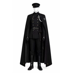 May include: A black military-style uniform featuring a double-breasted jacket with gold buttons, a long cape with a crest patch, matching trousers, and a peaked cap. The ensemble includes a black belt, a silver braided cord, and black boots.