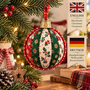 May include: A spherical fabric Christmas ornament featuring alternating vertical panels of dark green, cream, and red fabric with floral and holly berry patterns. The ornament is topped with a gold-coloured cap and a red ribbon for hanging.