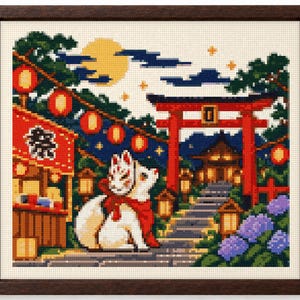 May include: A framed cross-stitch embroidery depicting a white fox wearing a red scarf and a mask, sitting before a red torii gate, a stone path, lanterns, and a yellow moon. The scene includes purple hydrangea flowers and a stall with Japanese text.