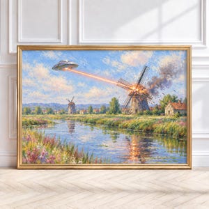 May include: A framed landscape painting depicting a rural scene with a river, wildflowers, and two windmills. A metallic flying saucer hovers in the blue sky, firing a bright orange laser beam at one of the windmills, causing it to explode in smoke.