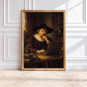 May include: A framed wall art print featuring a portrait of a person wearing a dark hat and a white ruff collar, seated at a wooden desk. The person is looking at a silver laptop computer placed on the desk, which also holds stacked books.