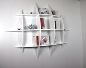 Design wall bookcase with invisible pm fasteners