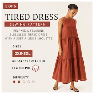 May include: A sewing pattern for a sleeveless tiered dress with a soft A-line silhouette, labelled TIRED DRESS. The pattern includes sizes 2XS-3XL, available in A4, A3, A0, and US Letter formats as a layered PDF. The difficulty level is marked as two out of five.
