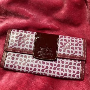 Portefeuille Coach vintage en cuir fuschia