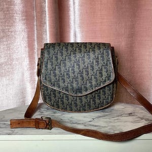 Bolso bandolera Dior Saddle de lona con monograma, estilo vintage de los años 90, icónico