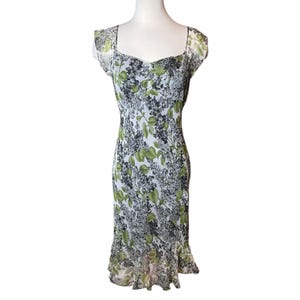 May include: A set of three ceramic mugs with a speckled, matte finish. The mugs are in shades of cream, light gray, and dark gray. Each mug has a simple, minimalist design, perfect for coffee or tea.