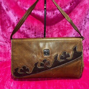 Fendi monogram clutch best sale