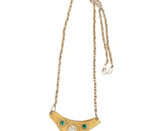 Collar vintage de los años 80 con diamantes de imitación verdes y transparentes en tono dorado.