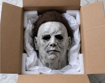 Masque d'horreur avec cheveux bruns, visage de tueur vieilli pour cosplay d'Halloween