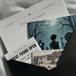 May include: A black envelope containing several printed items: a document titled THE CLOSED, a card showing a person in a cemetery under a full moon, a newspaper clipping with the headline GRAVE FOUND OPEN, and a map labelled ST. AGNES CEMETERY PLAN 1941.