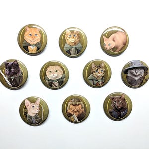 Cat of the Rings 1.5&quot; pinback buttons