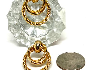 Gold toned circles within circles vintage earrings pierced ears