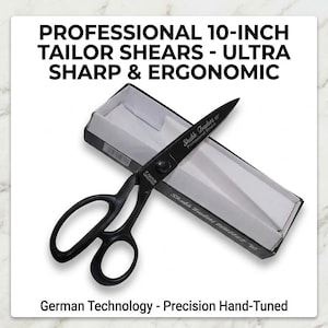 Puede incluir: Tijeras de sastre negras de 10 pulgadas con acabado mate, con el texto Shubh Traders 10" Professional Shears en la hoja. Las tijeras están colocadas sobre una caja de almacenamiento negra y blanca con el texto German Technology - Precision Hand-Tuned.