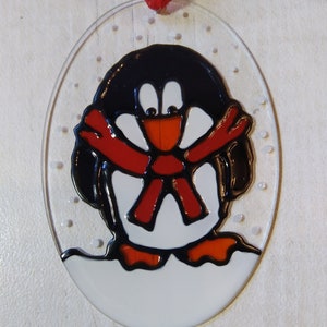 Christmas penguin sun catcher decoration. Hand painted ornament.