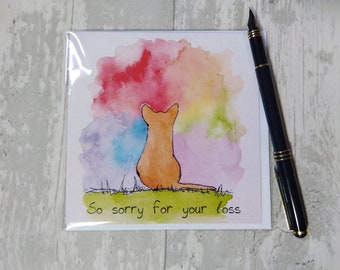 May include: A watercolor sympathy card with a cat sitting in front of a colorful rainbow background. The card reads "So sorry for your loss."
