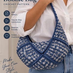 May include: A blue and grey crochet bag with a bobble texture and a shoulder strap. The image includes text: Crescent Bobble Bag, Crochet Pattern, PDF Pattern, Step-by-Step Instructions, Beginner Friendly, Instant Download, Make Your Own Style.